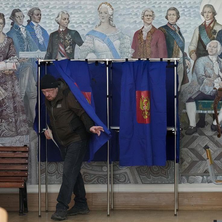 Putin basks in electoral victory that was never in doubt even as Russians quietly protest